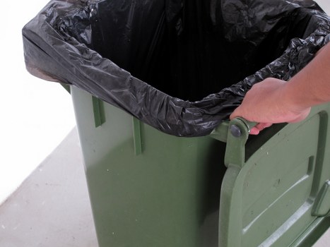 Workers sorting demolition waste materials